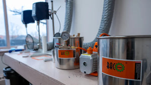 Professional resin mixing and vacuum chamber equipment used to formulate PetalSafe™ flower preservation resin at Everlasting Bloom Co.