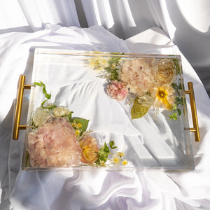 Handmade resin serving tray with preserved wedding bouquet flowers, gold handles, and elegant keepsake design by Everlasting Bloom Co.