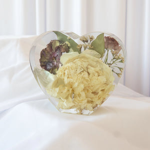 Heart-shaped resin keepsake with preserved cream peony, lisianthus, and baby's breath — wedding flower preservation by Everlasting Bloom Co.