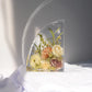 Left resin bookend featuring dried flowers from a wedding bouquet, preserved in crystal-clear epoxy.
