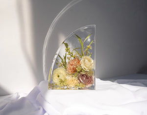 Left resin bookend featuring dried flowers from a wedding bouquet, preserved in crystal-clear epoxy.