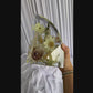 Resin bookends created with real wedding flowers, displayed as a finished keepsake set.