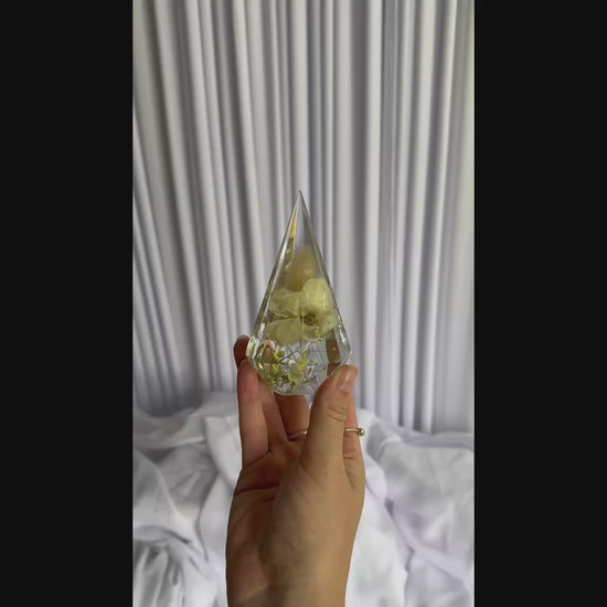 Close-up video of preserved wedding flowers in a resin ring holder keepsake by Everlasting Bloom Co.