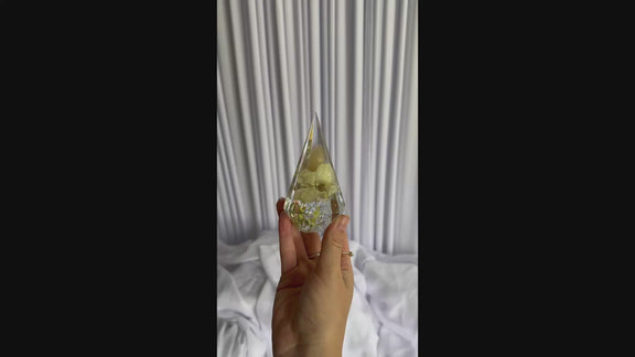 Close-up video of preserved wedding flowers in a resin ring holder keepsake by Everlasting Bloom Co.